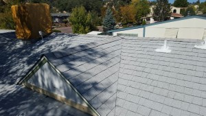 Laid Rite Roofing LLC_New roof_asphalt shingles_note wood repair for flashing